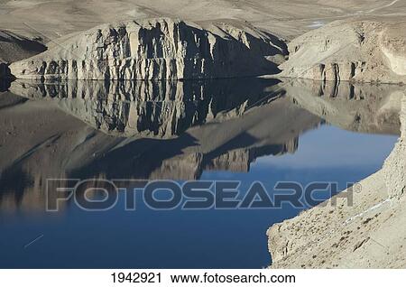 Stock Image - Hindu Kush Mountains Reflections In Band-I-Haibat (Dam Of Awe), Band-I-Amir, Bamian Province, Afghanistan. Fotosearch