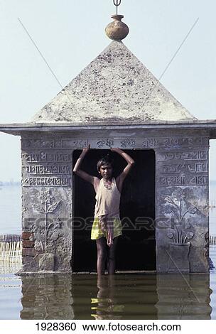 Hindu Shrine Immersed Ijn Floodwater View Large Photo Image Stock Image - Hindu Shrine Immersed Ijn Floodwater. Fotosearch