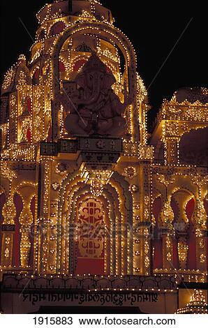 Stock Image - Hindu Temple Illuminated For Diwali. Fotosearch