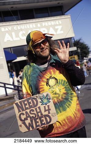 Hippy In Tie Dye Shirt Holding A Sign 'need Cash 4 Weed', San Francisco, California View Large Photo Image Stock Photo - Hippy In Tie Dye Shirt Holding A Sign 'need Cash 4 Weed', San Francisco, California. Fotosearch