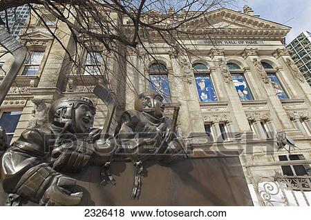 Stock Photo - Hockey hall of fame with bronze statues; Toronto ontario canada. Fotosearch