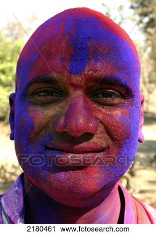 Stock Image - Holi festival of colours; Madhya Pradesh, India. Fotosearch