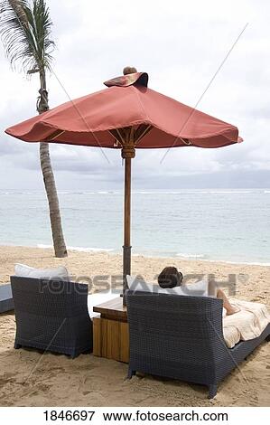 Holiday Maker In Sun Longer Fg Seaacin View Large Photo Image Stock Photo - Holiday Maker In Sun Longer Fg Seaacin. Fotosearch