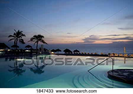 Holiday Resort At Dusk; Puerto Vallarta, Mexico View Large Photo Image Stock Image - Holiday Resort At Dusk; Puerto Vallarta, Mexico. Fotosearch