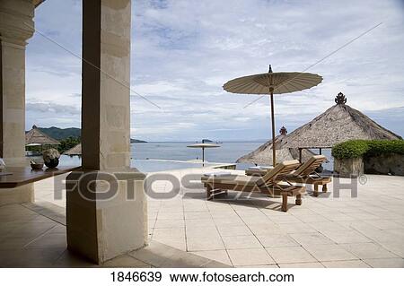 Holiday Resort By Sea; Bali, Indonesia View Large Photo Image Stock Photo - Holiday Resort By Sea; Bali, Indonesia. Fotosearch