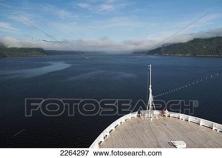 Stock Photo - Holland american maasdam cruise ship on the saguenay fjord; saguenay quebec canada. Fotosearch