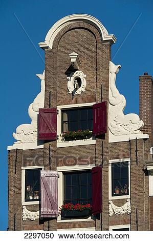 Holland, Detail of top of thin traditional gabled house; Amsterdam View Large Photo Image Stock Image - Holland, Detail of top of thin traditional gabled house; Amsterdam. Fotosearch