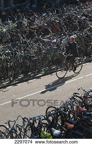 Picture - Holland, Large bike parking area beside Central Station; Amsterdam. Fotosearch