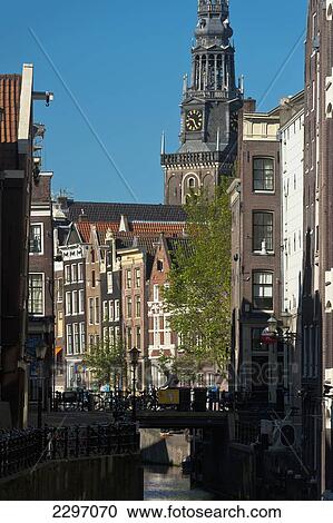 Holland, Looking along canal to Oude Kerk church; Amsterdam View Large Photo Image Stock Image - Holland, Looking along canal to Oude Kerk church; Amsterdam. Fotosearch