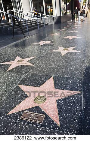 Hollywood Walk of Fame stars on the sidewalk of Hollywood Boulevard; Hollywood, California, United States of America View Large Photo Image Stock Image - Hollywood Walk of Fame stars on the sidewalk of Hollywood Boulevard; Hollywood, California, United States of America. Fotosearch
