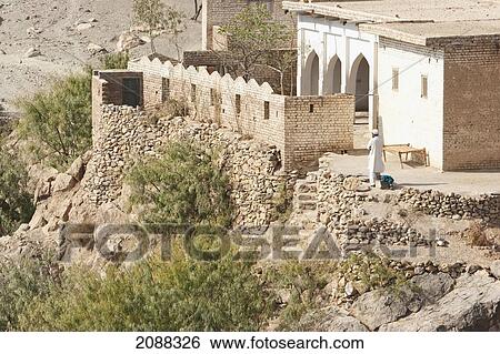 Stock Photograph - Home By The Road, Khyber Pass, Federally Administered Tribal Areas, Pakistan. Fotosearch