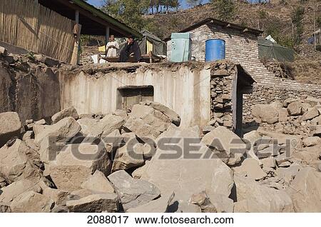 Stock Photo - Home Destroyed By The 8 October 2005 Earthquake, Kohala, Azad Kashmir, Pakistan. Fotosearch