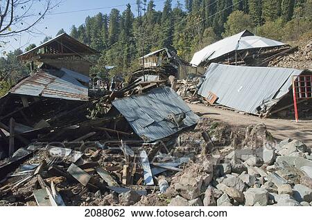 Stock Image - Homes Destroyed By The 8 October 2005 Earthquake, Dunglan, Azad Kashmir, Pakistan. Fotosearch