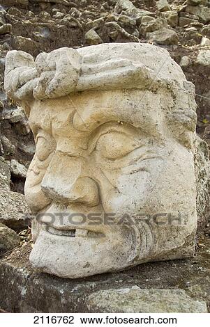 Honduras, Copan Ruinas, Copan Archeological Park, near Temple 11, stone head View Large Photo Image Stock Image - Honduras, Copan Ruinas, Copan Archeological Park, near Temple 11, stone head. Fotosearch