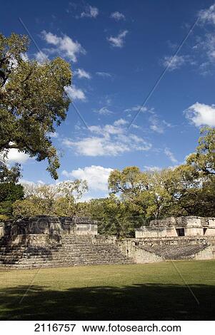 Stock Photo - Honduras, Copan Ruinas, Copan Archeological Park, Structure # 9 (left), Ball Court (right). Fotosearch