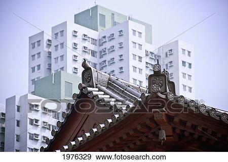 Stock Photo - Hong Kong, Diamond Hill Nk, Chi Lin Nunnery. Tang Style Buddhist Nunnery Is Contrasted By New Estate Buildings.. Fotosearch