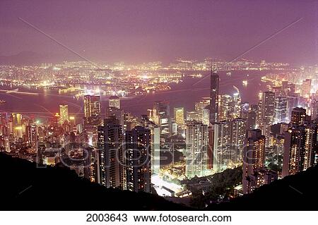 Stock Image - Hong Kong, Island, Kowloon At Twilight From Victoria Peak City Lights Illuminated. Fotosearch
