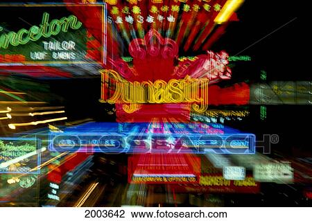 Stock Image - Hong Kong, Kowloon, Many Colorful Neon Lights, Signs Blurred. Fotosearch