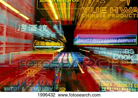 Stock Image - Hong Kong, Kowloon's Famous Neon Lights Shopper Paradise At Night, Blur Motion A73D. Fotosearch