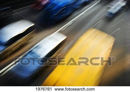 Stock Image - Hong Kong, Traffic Speeds Along Queensway, In Wanchai, Near The Convention Center.. Fotosearch