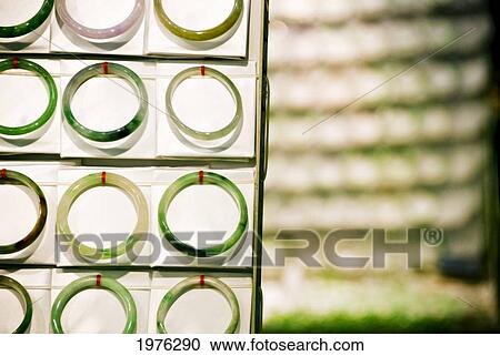 Hong Kong, Yau Ma Tei K, Jade Bracelets On Display At The Jade Market On Kansu And Battery Streets. View Large Photo Image Stock Image - Hong Kong, Yau Ma Tei K, Jade Bracelets On Display At The Jade Market On Kansu And Battery Streets.. Fotosearch