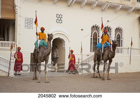 Stock Image - Honor Guard On Camel Back At Castle Mandawa, Rajasthan, India. Fotosearch