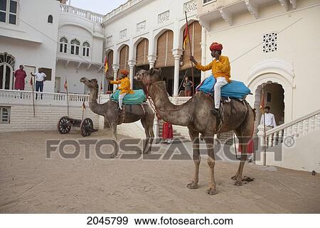 Honor Guard On Camel Back At Castle Mandawa, Rajasthan, India View Large Photo Image Stock Photo - Honor Guard On Camel Back At Castle Mandawa, Rajasthan, India. Fotosearch