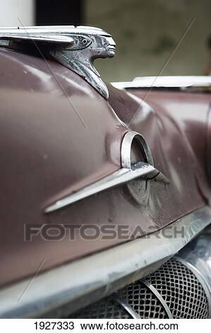 Stock Image - Hood Ornaments Of Old American Yanktank. Fotosearch