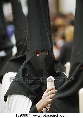Hooded People At Semana Santa Easter Festival View Large Photo Image Stock Photo - Hooded People At Semana Santa Easter Festival. Fotosearch