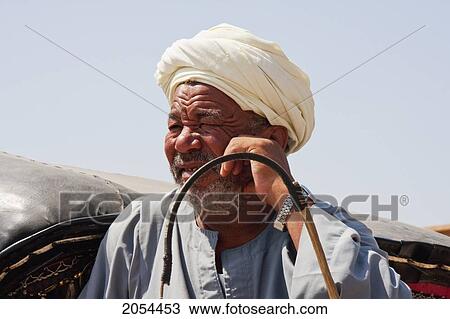 Horse Carriage Driver, Edfu, Aswan, Egypt View Large Photo Image Stock Image - Horse Carriage Driver, Edfu, Aswan, Egypt. Fotosearch