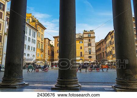 Stock Photograph - Horse drawn carriages in Piazza della rotonda in front of Pantheon; Rome, Lazio, Italy. Fotosearch