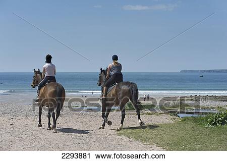 Horse Riding At Manorbier. Once Described As 'the Pleasantest Place In Wales'. Pembrokeshire. Wales. Cymru. Uk. United Kingdom. View Large Photo Image Stock Image - Horse Riding At Manorbier. Once Described As 'the Pleasantest Place In Wales'. Pembrokeshire. Wales. Cymru. Uk. United Kingdom.. Fotosearch