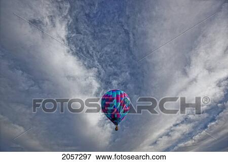 Stock Photo - Hot Air Balloon In Blue Sky With Clouds.. Fotosearch