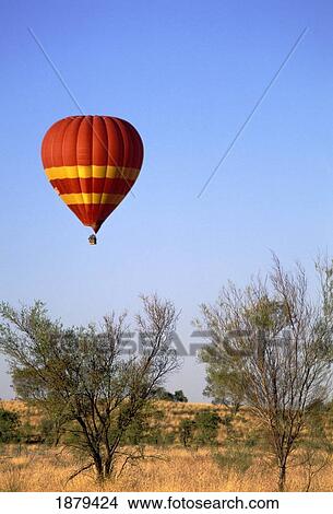 Picture - Hot Air Ballooning Over The Australian Outback. Fotosearch