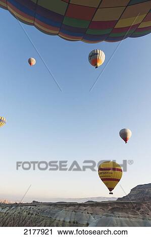 Stock Image - Hot Air Balloons In Flight; Goreme Nevsehir Turkey. Fotosearch