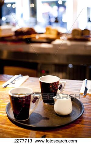 Hot drinks on a tray in cafe Del Aziz, Fulham; London, England View Large Photo Image Stock Image - Hot drinks on a tray in cafe Del Aziz, Fulham; London, England. Fotosearch