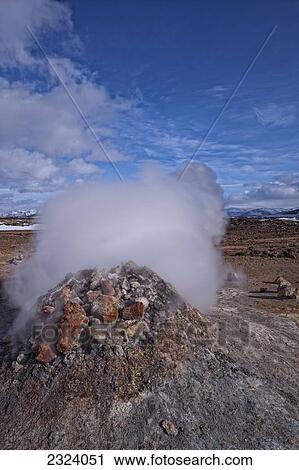 Stock Image - Hot sulphurous steam rises from a vent at Hverir near Myvatn Lake, northern Iceland; Iceland. Fotosearch