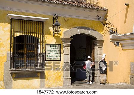 Hotel Convento Santa Catalina, Antigua, Guatemala, Central America; Tourist Outside Hotel Entrance View Large Photo Image Stock Image - Hotel Convento Santa Catalina, Antigua, Guatemala, Central America; Tourist Outside Hotel Entrance. Fotosearch