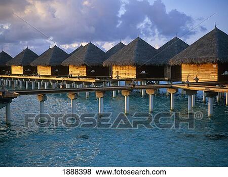 Stock Photo - Hotel Huts On Stilts. Fotosearch