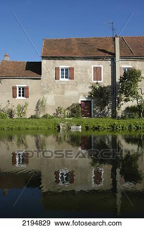 Stock Photo - House In St Leger-Sur-Dheune Beside The Canal Du Centre, Burgundy, France.. Fotosearch