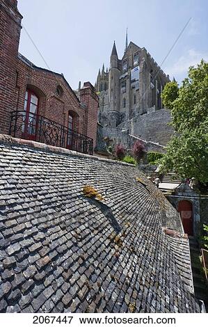 House In The Fortified Village And Abbey Of Mont-Saint-Michel, France View Large Photo Image Stock Photo - House In The Fortified Village And Abbey Of Mont-Saint-Michel, France. Fotosearch