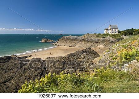 House Perched Above Beach In The Village Of Rotheneuf Near St Malo, Brittany, France View Large Photo Image Stock Photo - House Perched Above Beach In The Village Of Rotheneuf Near St Malo, Brittany, France. Fotosearch