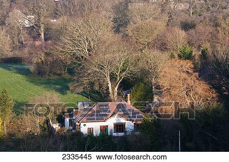 House Roof With Solar Panels; Glastonbury, Somerset, England View Large Photo Image Stock Photography - House Roof With Solar Panels; Glastonbury, Somerset, England. Fotosearch
