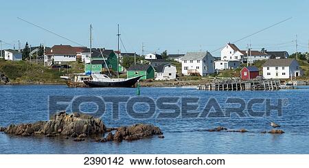 Houses along the atlantic coastline and a boat mooring at the shore; Twillingate, Newfoundland and Labrador, Canada View Large Photo Image Stock Image - Houses along the atlantic coastline and a boat mooring at the shore; Twillingate, Newfoundland and Labrador, Canada. Fotosearch
