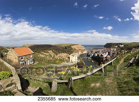 Houses Along The River And Coastline; Staithes, Yorkshire, England View Large Photo Image Stock Photography - Houses Along The River And Coastline; Staithes, Yorkshire, England. Fotosearch