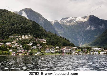 Houses Along The Sogneford With Mountains In The Background; Balestrand Sogn Norway View Large Photo Image Stock Photography - Houses Along The Sogneford With Mountains In The Background; Balestrand Sogn Norway. Fotosearch