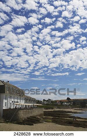 Stock Photo - Houses along the water; St. Mawes, Cornwall, England. Fotosearch