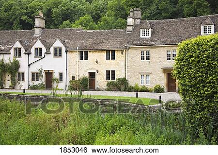 Houses In Castle Combe, Cotswolds, Wiltshire, England View Large Photo Image Stock Photograph - Houses In Castle Combe, Cotswolds, Wiltshire, England. Fotosearch