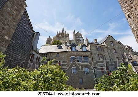 Stock Image - Houses In The Fortified Village And Abbey Of Mont-Saint-Michel, France. Fotosearch