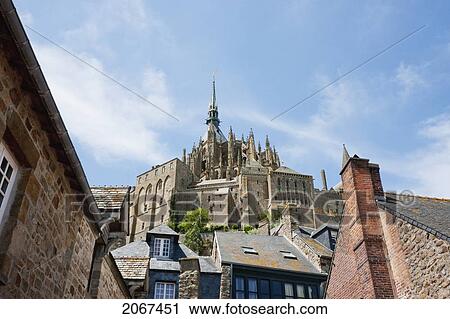 Stock Image - Houses In The Fortified Village And Abbey Of Mont-Saint-Michel, France. Fotosearch